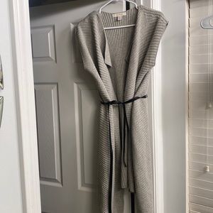 Open leather tor sweater